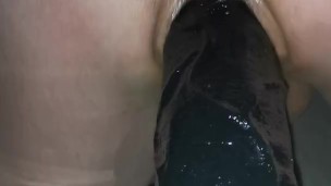 Anal training with a big black dildo