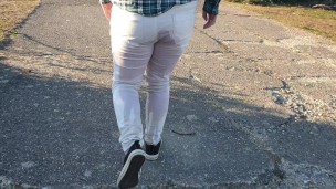 Close up white jeans pee outdoors. Who needs toilets? ;)