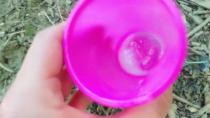 Big cock cums into a cup and lets his cum load at the cruising area for horny guy