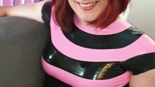 Lucy posing in Latex dress and chastity cage