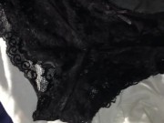 Shooting my cum on black lace panties.