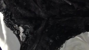 Shooting my cum on black lace panties.