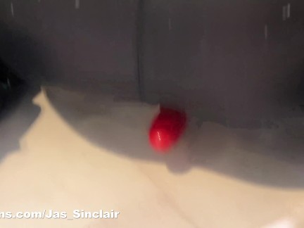 Super tight leather leggings with red lipstick and a VERY lucky toy...