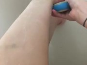 Girl washing sore feet and ankles after working long shift 9/16