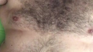 Big horny bearded Italian bear with hairy chest strokes his body