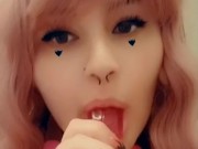 Cute puppy girl sucks pink dildo 