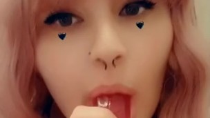 Cute puppy girl sucks pink dildo 