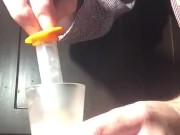loading a syringe of my thawed cum loads to inject into my wife's pussy 