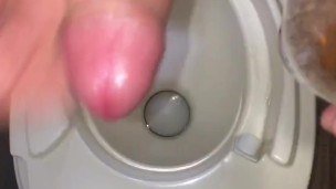 Watch my POV of filling up an empty water bottle full of my piss, then I J/O & CUM inside the bottle