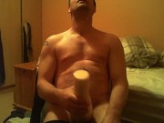 Sitting on chair watching porn fucking a felsh light till I ejaculate 14/16