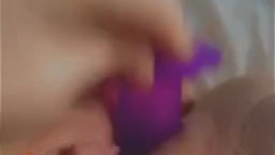 Babe Fucks Herself W/ Purple Dildo