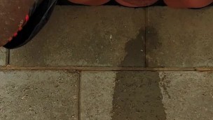 Taking a long piss outside in public 