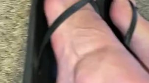 POV Flip Flops Showing Off Skinny Feet and Toes