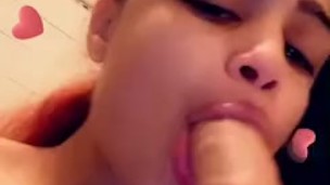 Sucking a strapless dildo 