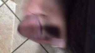 Rubbing my cock in the bathroom at work 