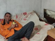 One evening I listen to the radio and taste an apple.