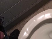slave peeing in public toilet