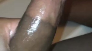 Stroking oiled up BBC