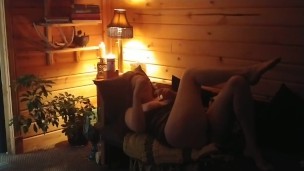 witchy woman blows bubbles in her cabin alone
