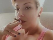 Smoking a blunt with my huge tits out