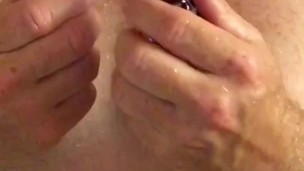 Solo male, horny & alone in the shower. Jerks off & Cums twice while using a glass anal toy upclose.