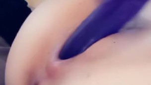 MILF fucks herself with a dildo