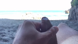 Slow motion cumshot on public beach