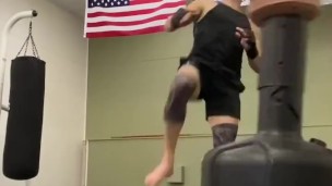 Mucsle stud kickboxer with perfect feet