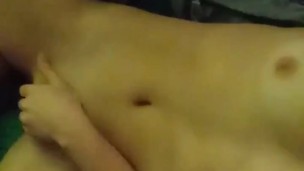 Masturbating