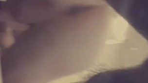 Man Bent over in mirror.
