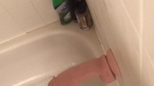 Big dildo fucking Sam in the shower