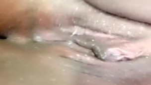 Plays with black wet pussy