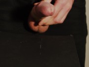 Thick uncut dick growing in black jeans. Natural foreskin. Cum on black plate. 14/16