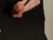 Thick uncut dick growing in black jeans. Natural foreskin. Cum on black plate. 15/16