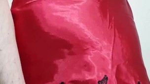 Crossdresser cums in red satin and lace lingerie