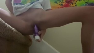 Horny college girl masturbates on stairs while roommate is in her room