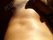 While taking sunbath she is masturbating with her toy - Petite Dream