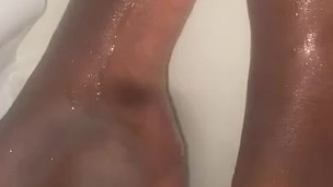 Size 12 male feet, while in the shower.