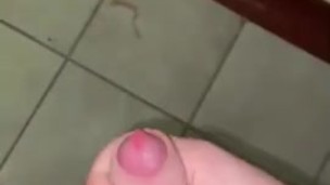 my uncut cock cumming in public bathroom