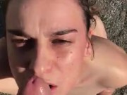 tattooed girl gives blowjob at beach  14/16