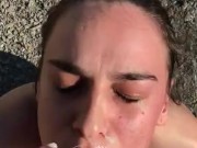 tattooed girl gives blowjob at beach  16/16