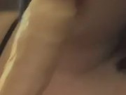 Tattooed girl sucks on huge toy