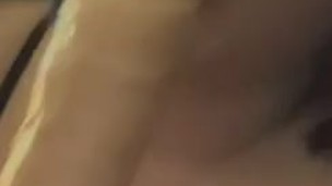 Tattooed girl sucks on huge toy