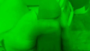 Tattooed guy jerks off with night vision. 