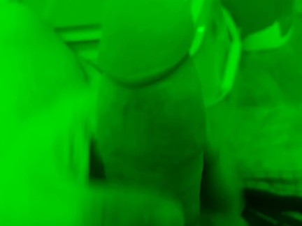 Tattooed guy jerks off with night vision. 
