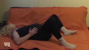 pregman in labor on the sofa