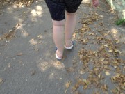 BBW in flip flops walks along the sidewalk while a voyeur peeps on her feet Public foot fetish 1/16
