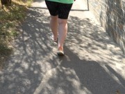 BBW in flip flops walks along the sidewalk while a voyeur peeps on her feet Public foot fetish 12/16