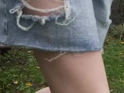 Girl Pissing outside on bench