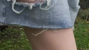 Girl Pissing outside on bench